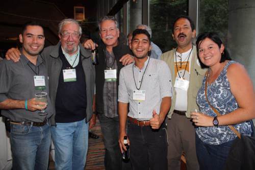 Terry Rich (center) with some of our Latin American partners at PIFV. Individuals from more than a dozen countries are lending their expertise to the Partners in Flight planning process.