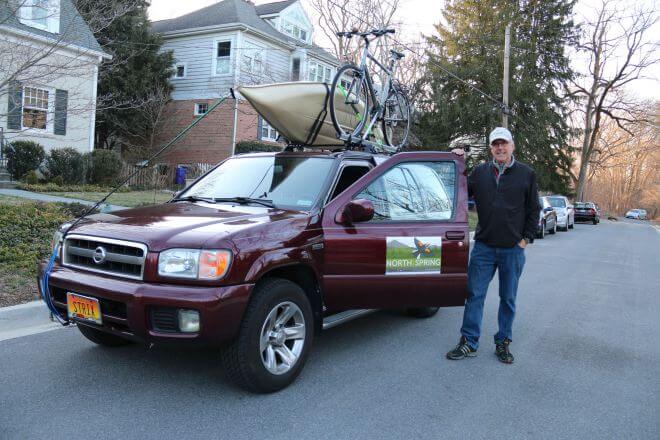 The car - laden with camping equipment, a bike, and a kayak - is packed and ready to go. Photo courtesy Bruce Beehler