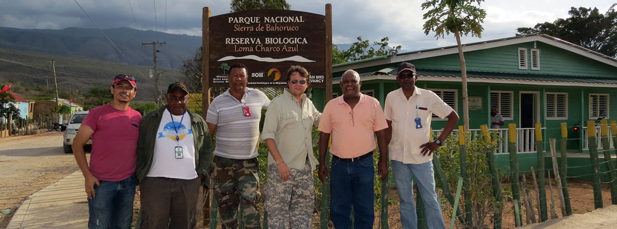 Leaders in park conservation, shown at an initial meeting at Sierra de Bahoruco National Park's Visitor Center. Left to right: Cesár Abrill Caceres (Coordinator–SOH); Ramón Marrero Terrero (Provincial Director of Pedernales); Luis Peguero (Coordinator–Protected Areas); Jorge Brocca (Executive Director, SOH); Professor José Almonte (Chairman of the Planning Commission); and José Jimenez (former park administrator). Photo courtesy of SOH, May 2015