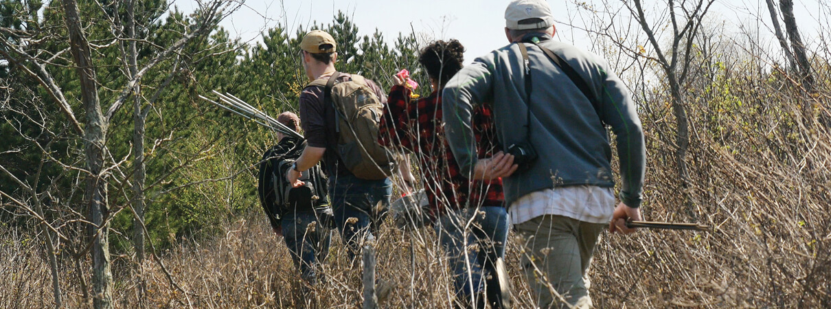 Jeff Larkin and crew head into young forest in search of Golden-winged Warblers. Photo by Aditi Desai.