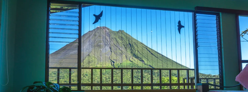 Bird-friendly window products have little impact on views. Photo by Arenal Observatory Lodge