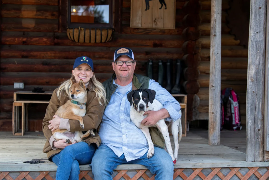 Brenda and Jerry Havel with their dogs Mika and Miss Kit at their warbler-rich property in northern Minnesota.