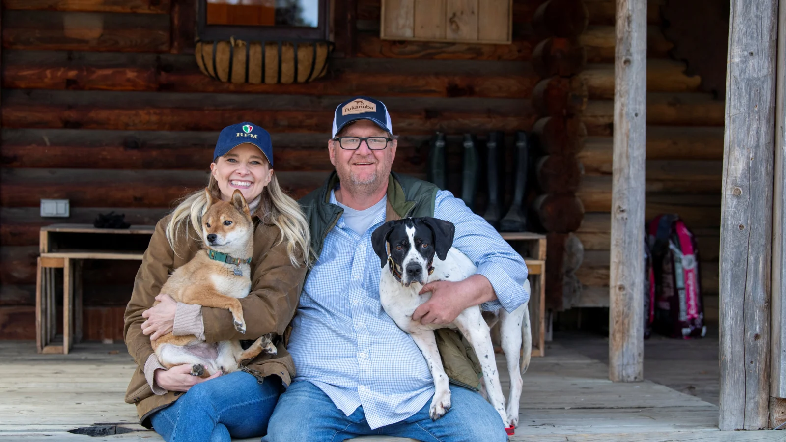 Brenda and Jerry Havel with their dogs Mika and Miss Kit at their warbler-rich property in northern Minnesota.